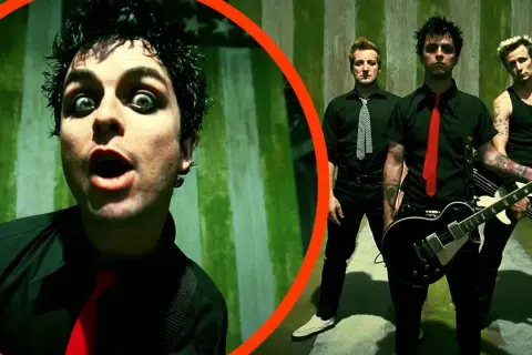 Zespół Green Day w teledysku do albumu koncepcyjnego American Idiot. Billie Joe Armstrong z wyrazistym makijażem oczu.