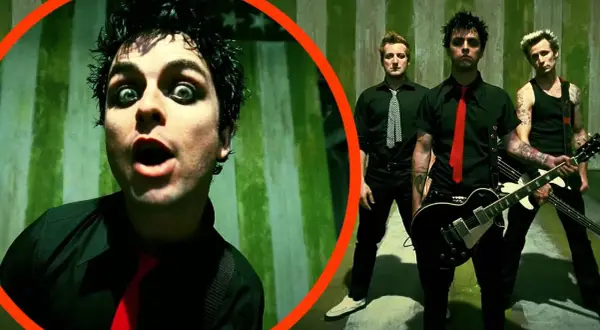 Zespół Green Day w teledysku do albumu koncepcyjnego American Idiot. Billie Joe Armstrong z wyrazistym makijażem oczu.